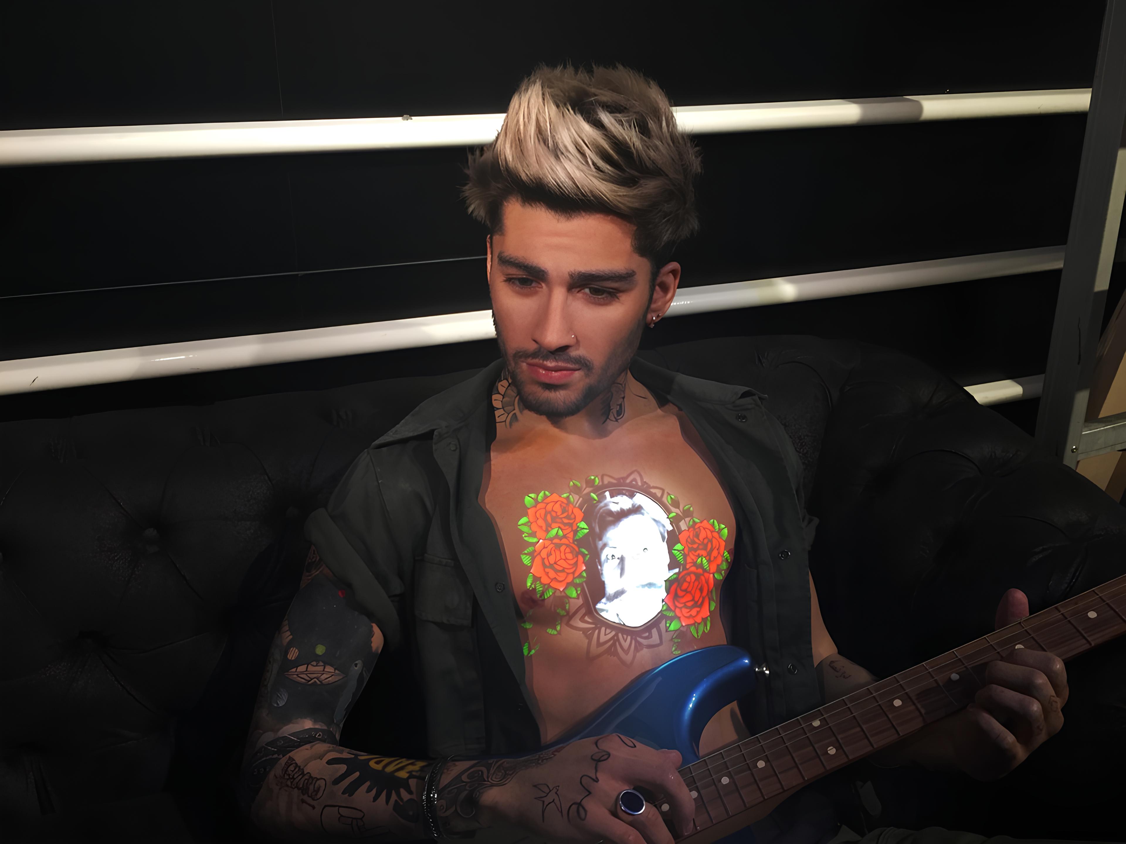 Figmersive Tattoo at Madame Tussauds lets fans create personal moments with Zayn Malik by blending technology and celebrity culture.
