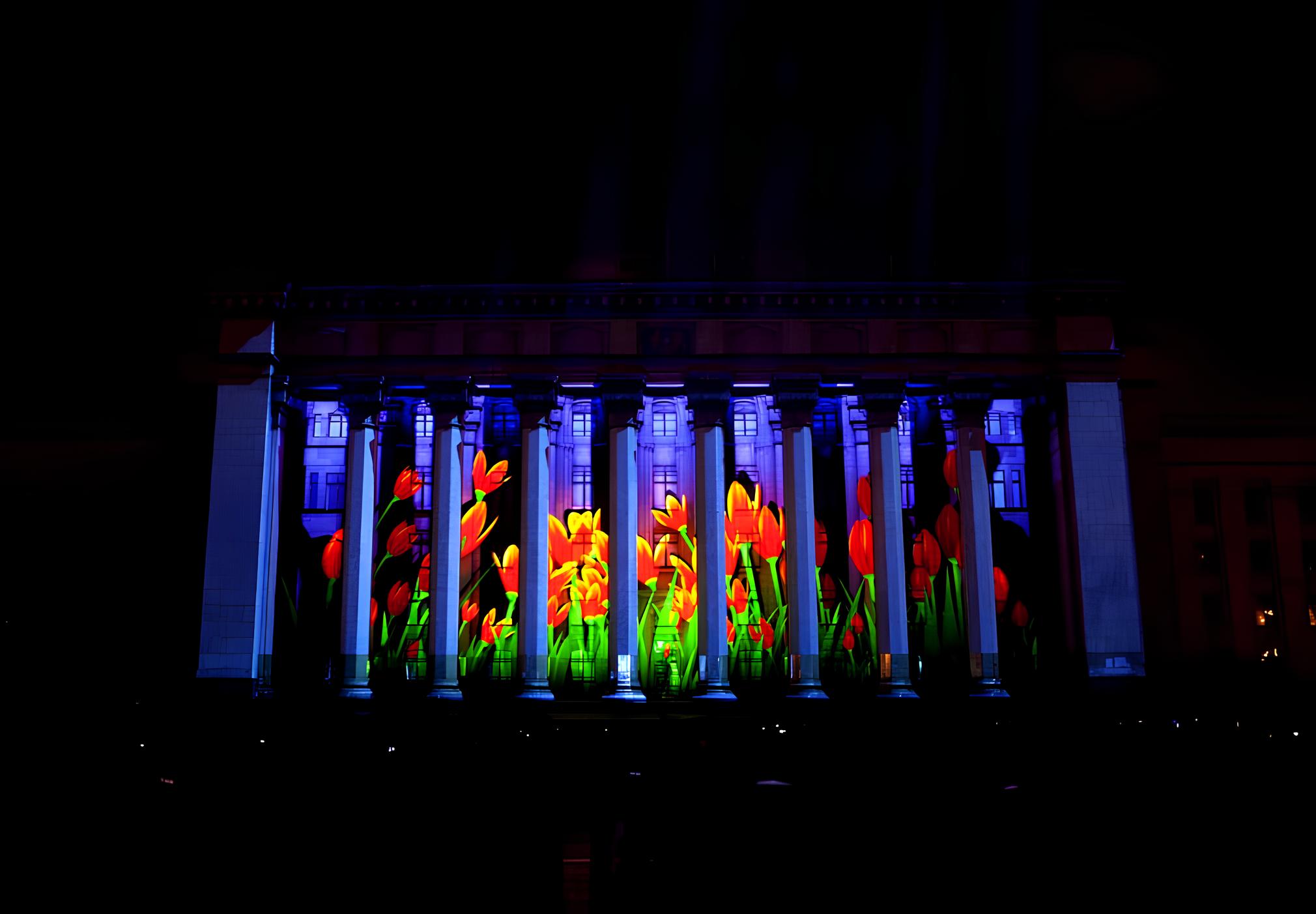 Asian Winter Games, projection mapping, Kazakhstan, patriotic icons, international unity, visual storytelling, cultural pride, engaging spectacle, Almaty, immersive visuals, international audience, local engagement, innovative storytelling, captivating narrative, winter sports celebration.